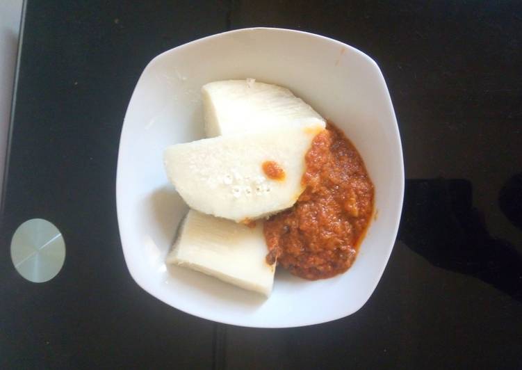 Boiled yam and dry fish stew