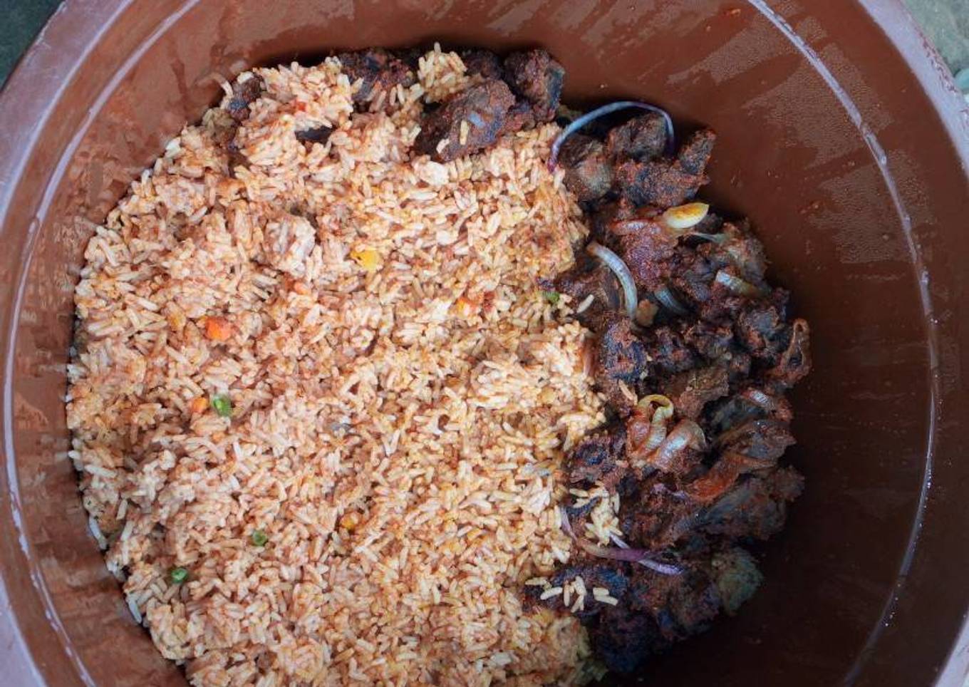 Pepper goat meat & jollof rice