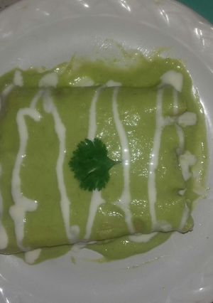 A picture of Green Enchiladas with Avocado Sauce.