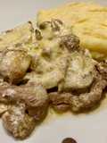 Filetes gratinados con champiñones