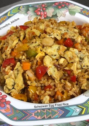 A picture of Schezwan Egg Fried Rice.