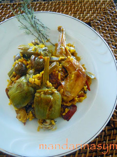 Una foto de Arroz con conejo y caracoles