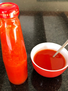 Una foto de Salsa líquida de ají chileno cacho’e cabra 🌶