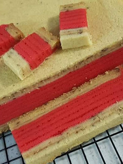 A picture of Chocolate Rice Pinkblanket Layer Cake.