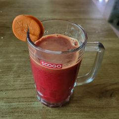 A picture of Healthy juice of carrot, amla and beet.