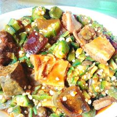 A picture of Okro Soup With Assorted Meat.