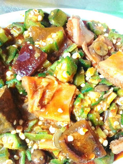 A picture of Okro Soup With Assorted Meat.