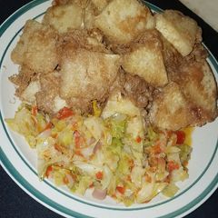 A picture of Yam and egg with cabbage source.