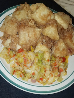 A picture of Yam and egg with cabbage source.