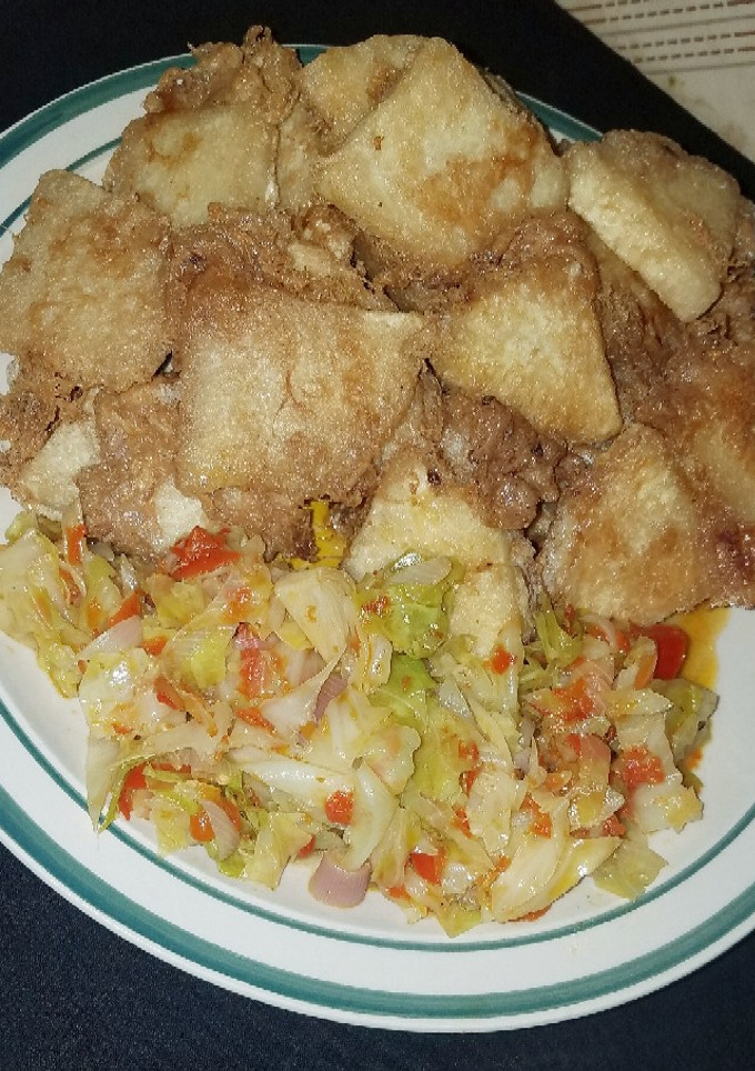 A picture of Yam and egg with cabbage source.