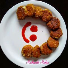 A picture of Cheesy Cabbage Tikki.