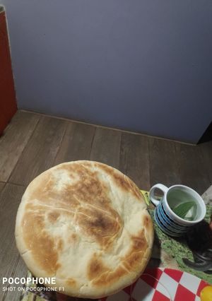 Una foto de Tortilla de pan cocinada en sartén