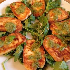 A picture of Fried Halloumi Cheese with Caper and Basil Dressing.