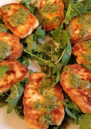A picture of Fried Halloumi Cheese with Caper and Basil Dressing.