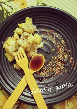 A picture of Cheesy pan potatoes.