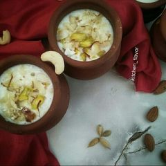 A picture of Meethi lassi with dry fruits.