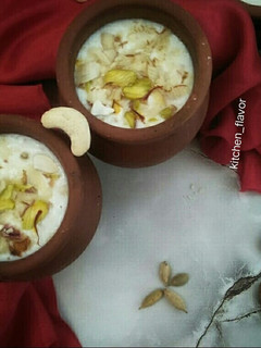 A picture of Meethi lassi with dry fruits.