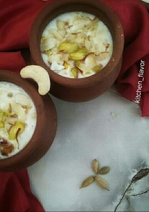 A picture of Meethi lassi with dry fruits.