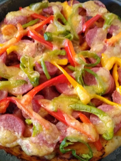 A picture of Pepperoncini,bell pepper,easy peel sausage in boboli pizza crust.