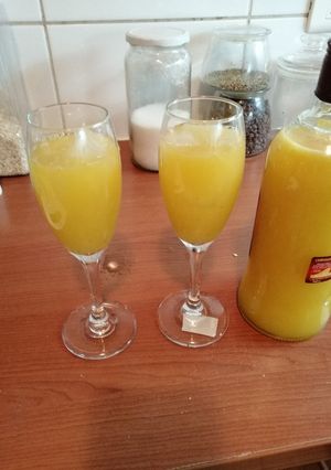 Una foto de Sour con limón y mandarinas