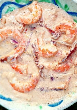 Une photo de Crevettes à l'ail sauce parmesan