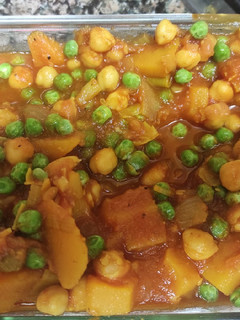 Una foto de Guiso de garbanzos con calabaza🎃🍅
