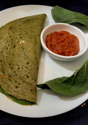 A picture of Stuffed Yellow Moong Daal Palak Cheela.