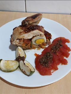 Una foto de Medio pollo relleno