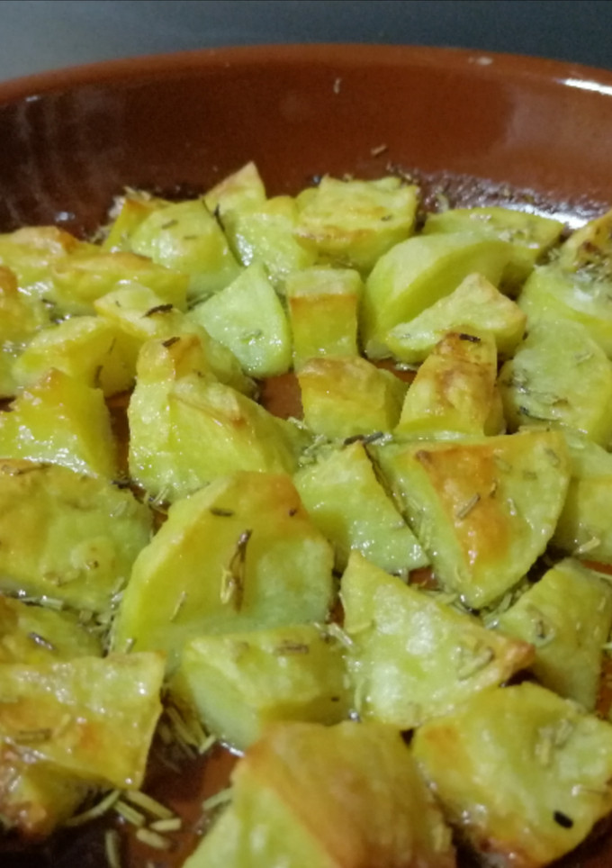 Una foto de Patatas al romero en microondas
