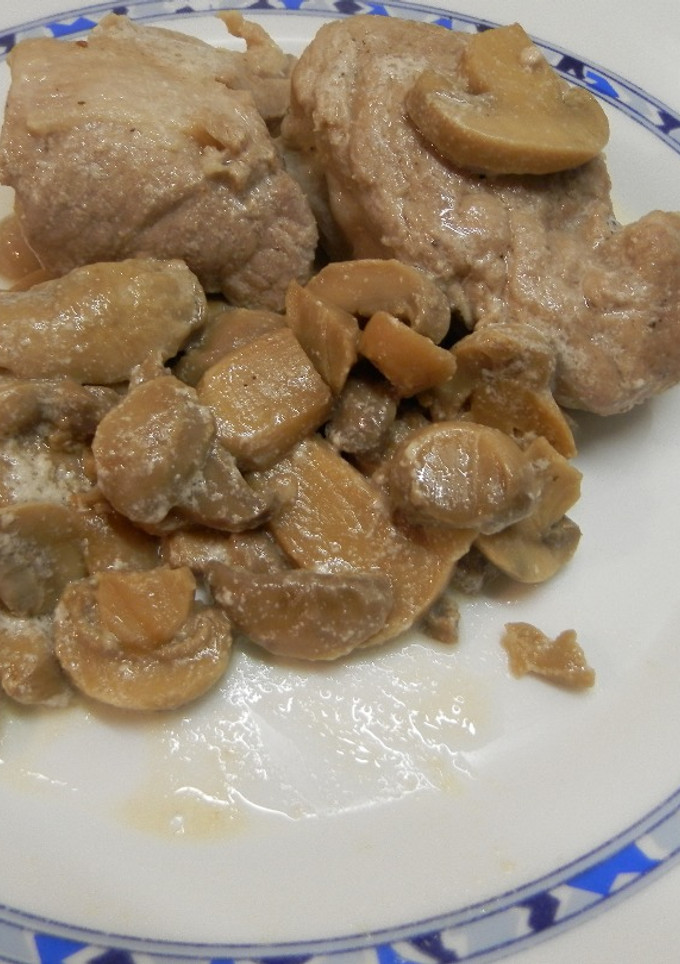Una foto de Solomillo de cerdo con champiñones