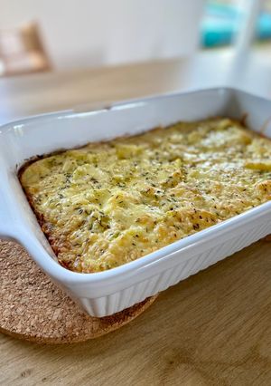 Una foto de Tartiflette de calabacín, jamón serrano y queso