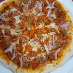 Chicken tikka pizza A picture of Chicken tikka pizza.