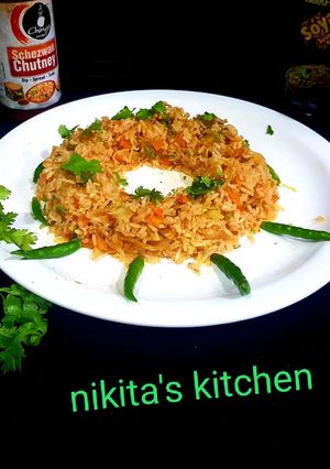 A picture of Veg Schezwan Fried Rice.