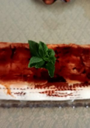 Una foto de Tarta de queso con cuajada y galletas