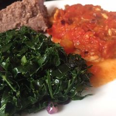 A picture of Fried kales with brown ugali.