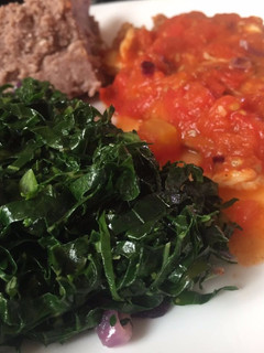 A picture of Fried kales with brown ugali.