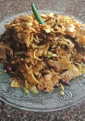 A picture of Fried Flattened Rice with papad #Goldenapron #post 20.