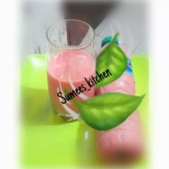 A picture of Orange and strawberry, watermelon smoothie.