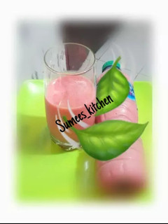 A picture of Orange and strawberry, watermelon smoothie.