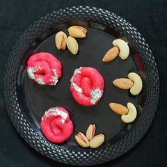 A picture of Marzipan Strawberry Jalebi.