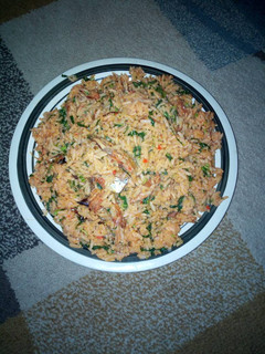 A picture of Native jollof rice and spinach.