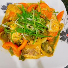 Steam barramundi fillets with pickled mustard and tomatoes A picture of Steam barramundi fillets with pickled mustard and tomatoes.