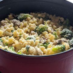 A picture of Broccoli mushroom cheddar mac and cheese.