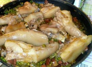 Foto principal de Rabos y manitas de cerdo con verduras