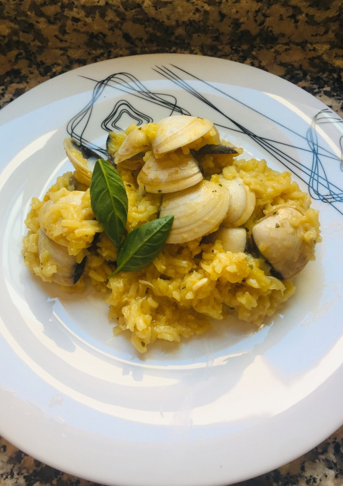 Una foto de Arroz con Almejas