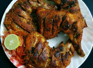 A picture of Baked Whole Chicken Legs.