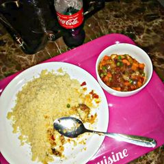A picture of Couscous and veggies soup.