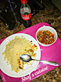 A picture of Couscous and veggies soup.