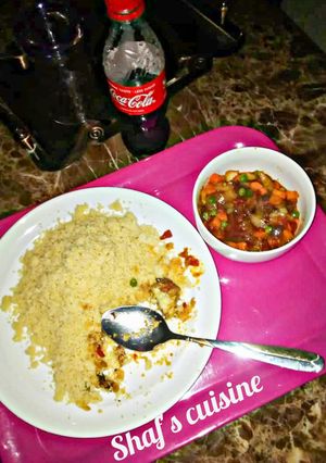 A picture of Couscous and veggies soup.