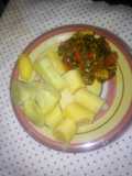 Boiled sweet potato and plantain with ugwu stew